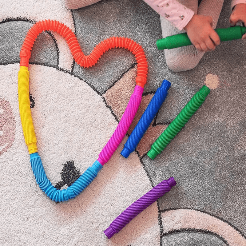 Färgglad Poprörleksak – Sensorisk och Sträckbar Lek för Barns Kreativitet och Motorik