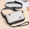 Travel bag-inspired crossbody bag