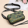 Travel bag-inspired crossbody bag