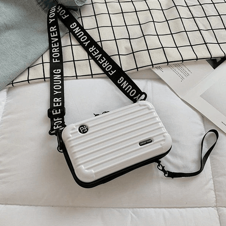 Resväska-inspirerad crossbody-väska