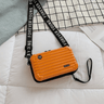 Travel bag-inspired crossbody bag