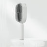 Self-cleaning hairbrush One Click
