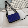 Travel bag-inspired crossbody bag