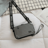 Travel bag-inspired crossbody bag