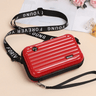 Travel bag-inspired crossbody bag