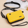 Travel bag-inspired crossbody bag