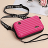 Travel bag-inspired crossbody bag