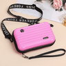 Travel bag-inspired crossbody bag