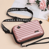 Travel bag-inspired crossbody bag
